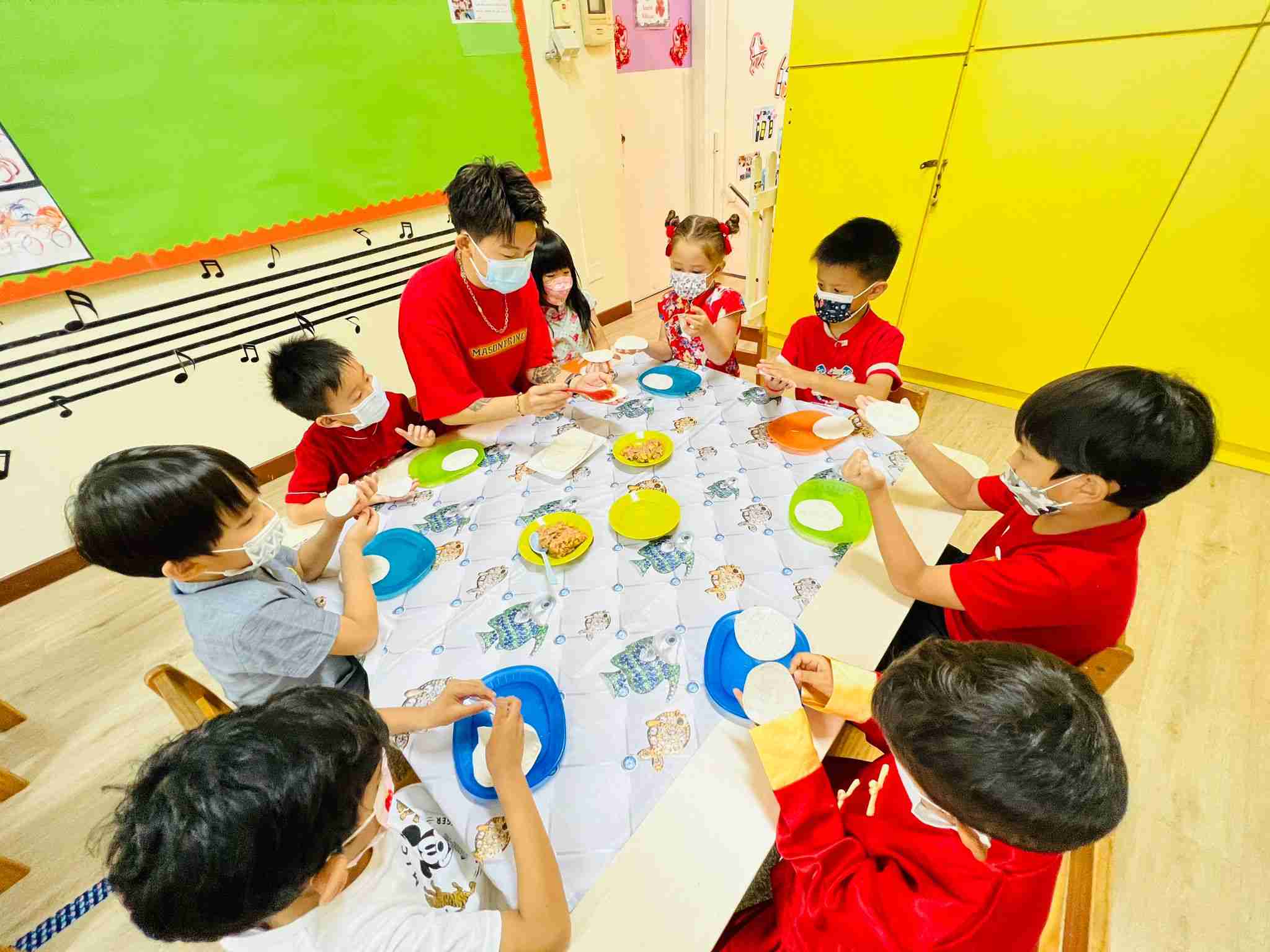 kids making chinese dumplings preschool