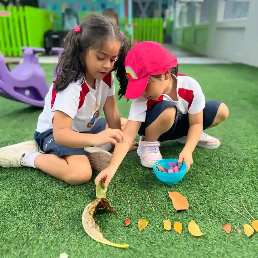 A Shaws Preschool child engaged in a hands-on learning activity
