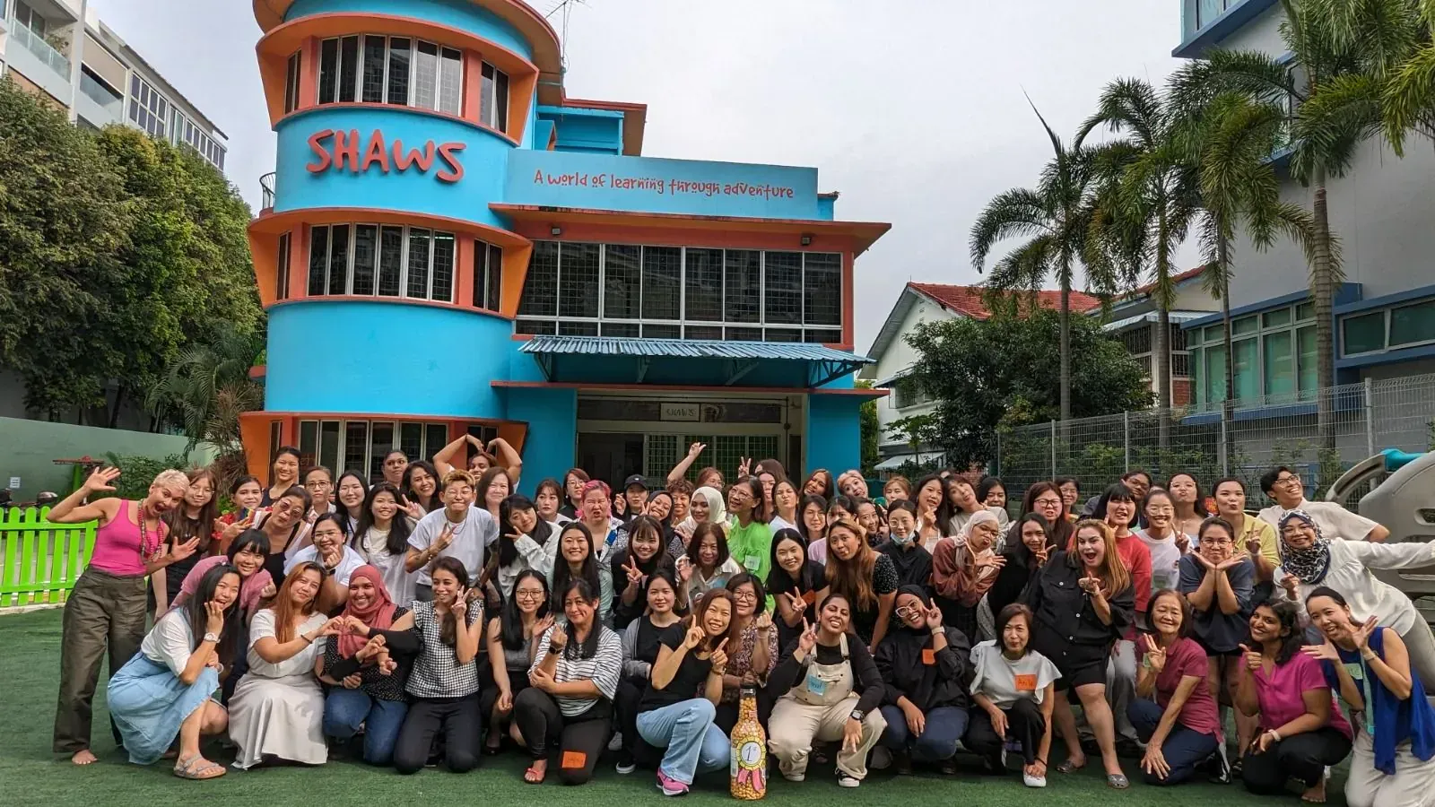 Shaws Preschool teachers with children
